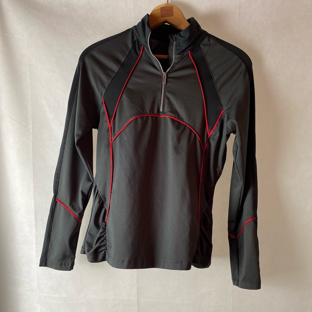 TAIL tennis shirt.